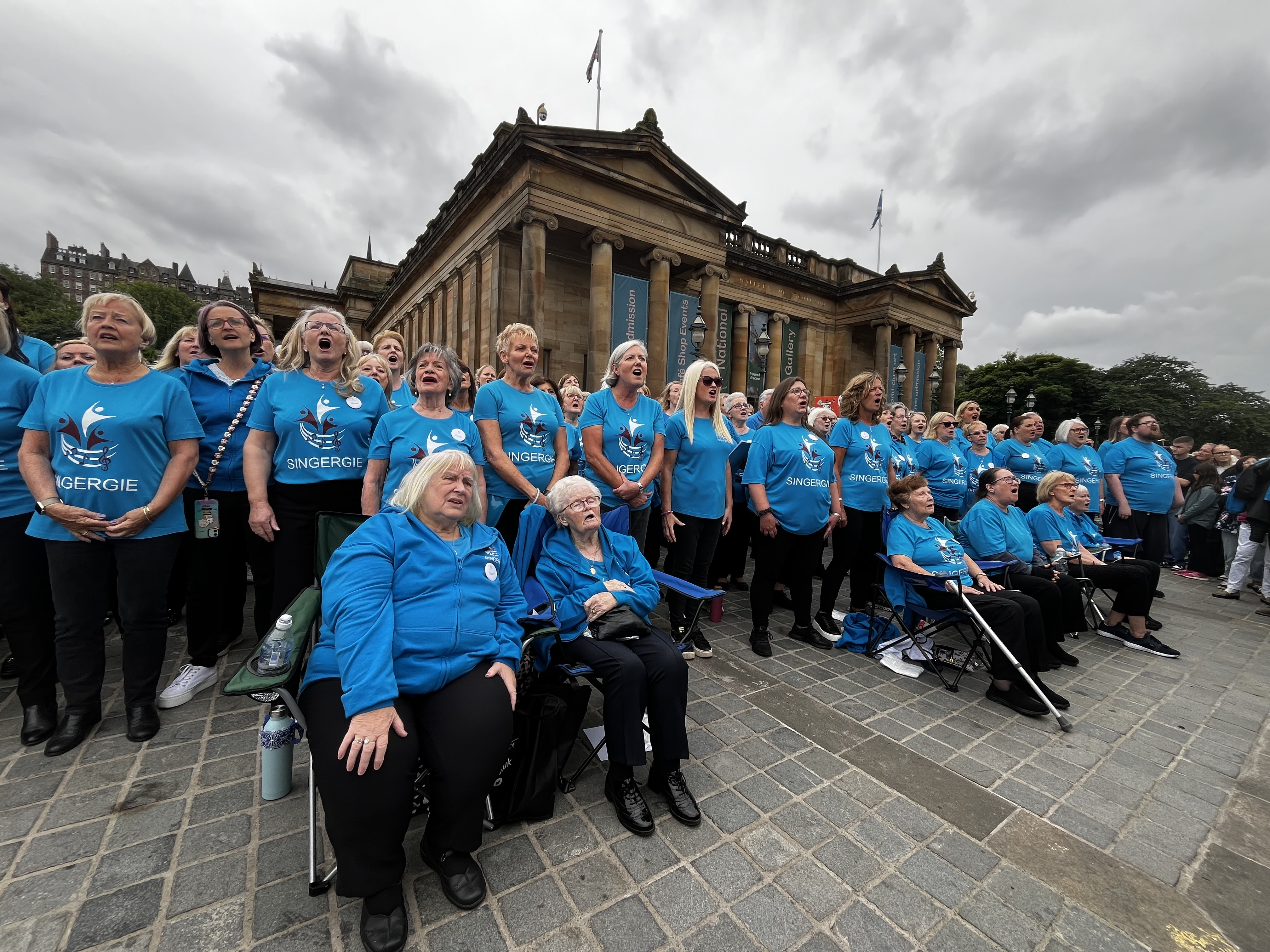 A group of Singergie members performing