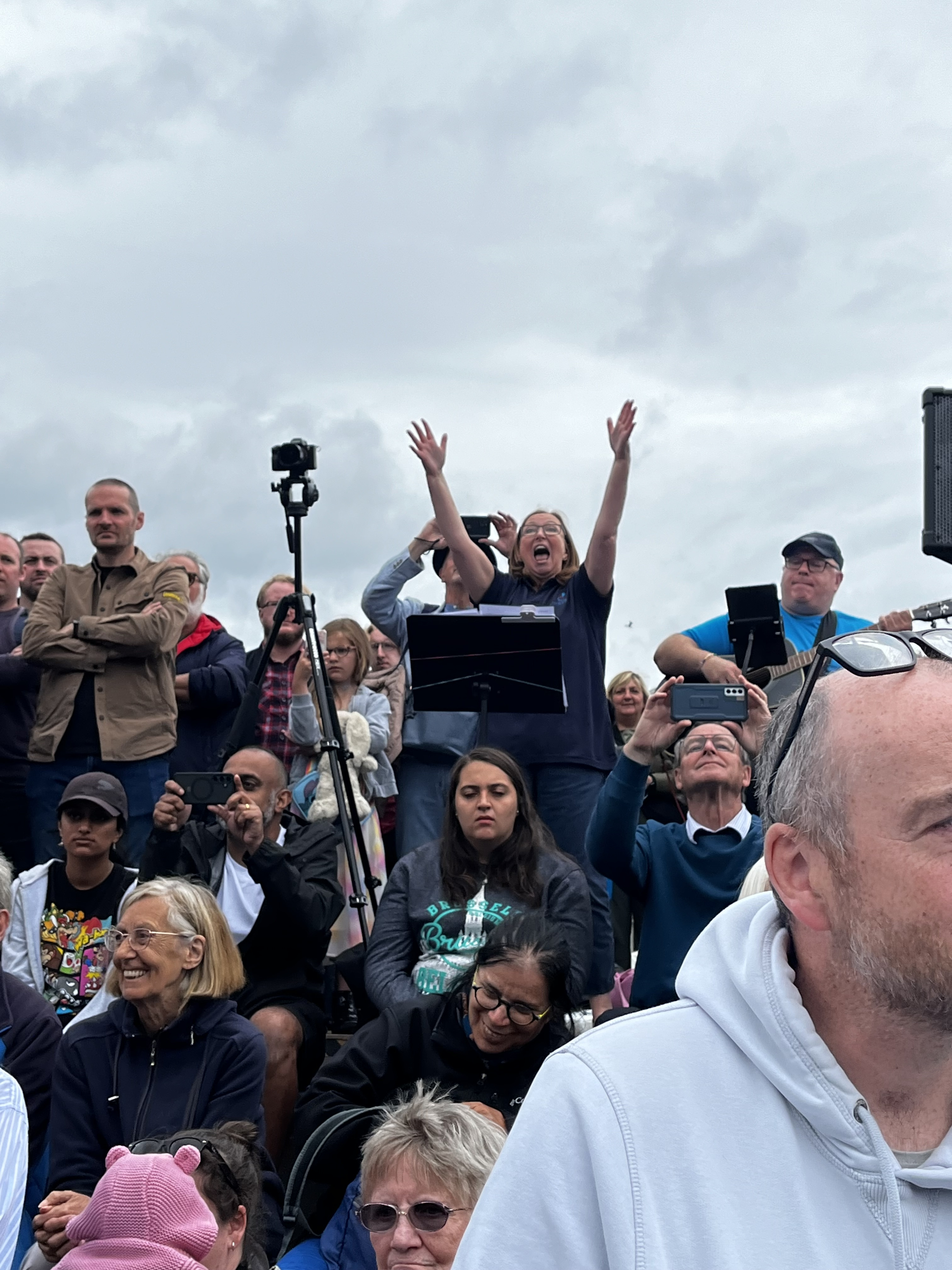 Choir coach directing a performance