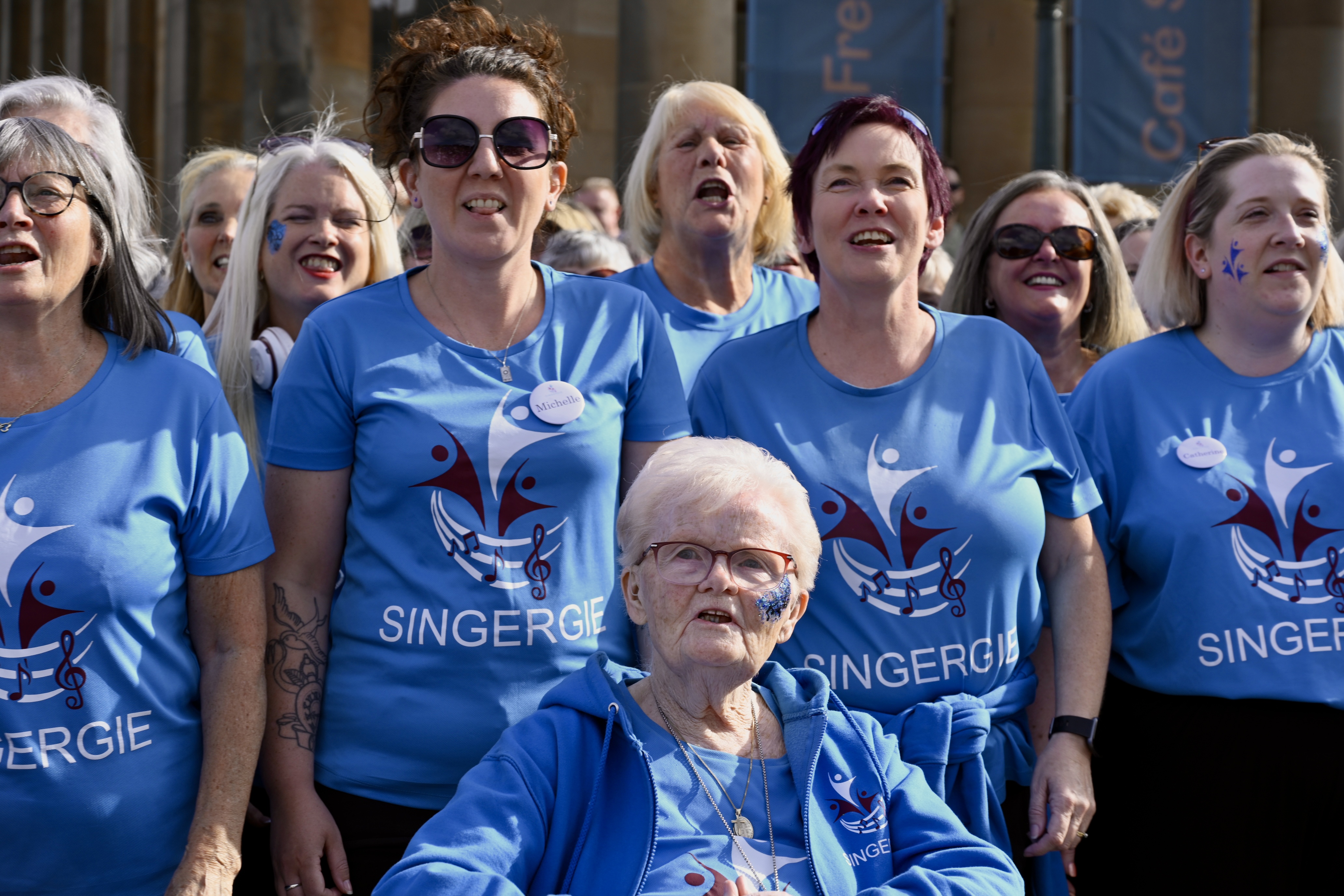 A group of Singergie members performing at the Fringe Festival 2025