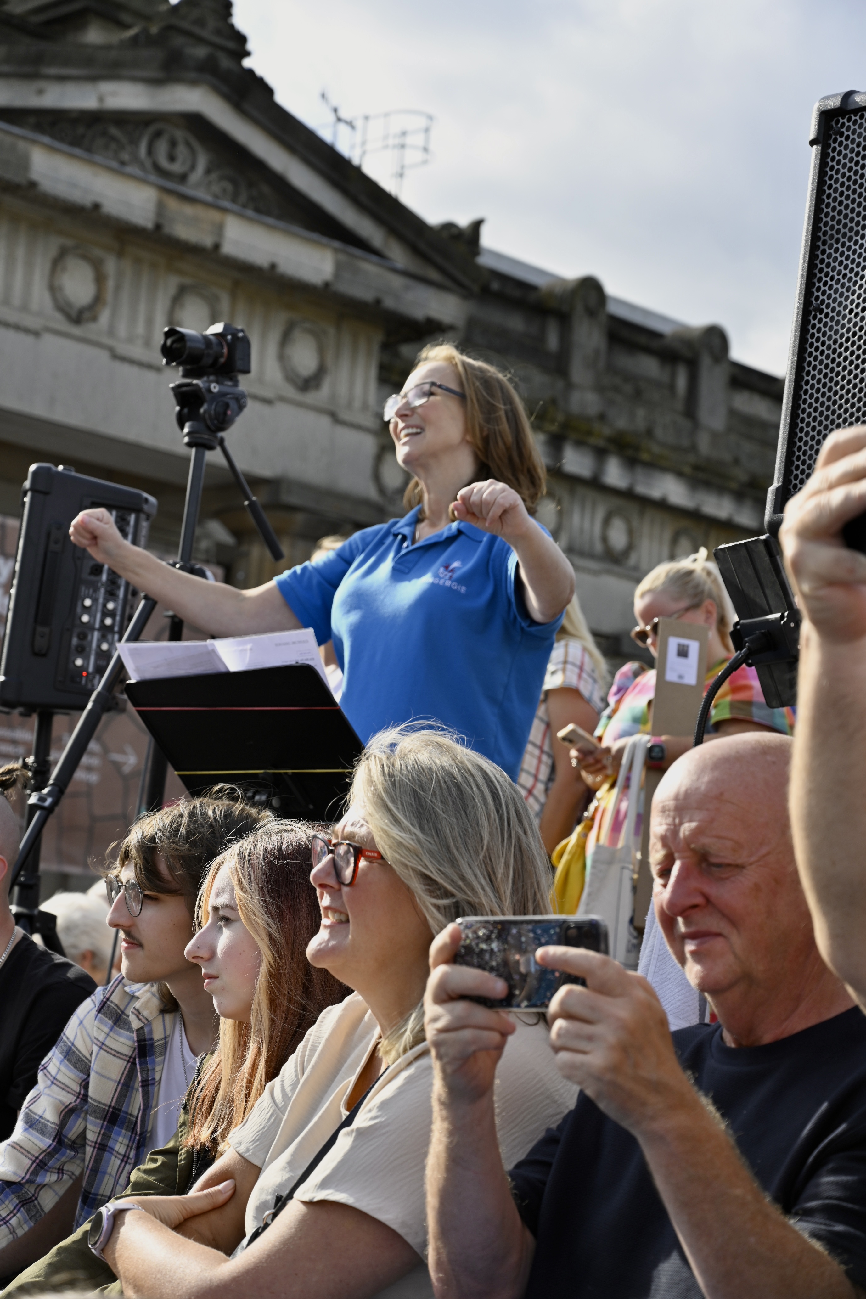 Choir coach directing a performance