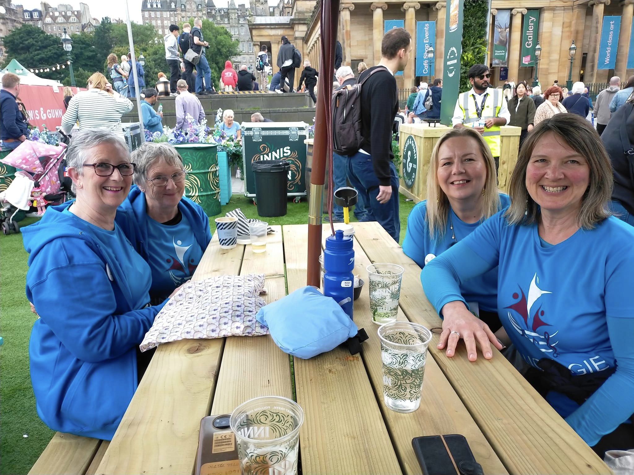 A group of Singergie members sitting and chatting